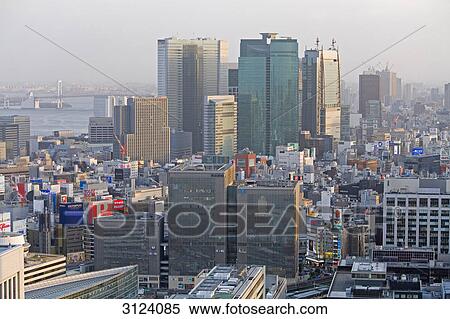 Cityscape of Tokyo, Ozean in the background, Japan, aerial perspective View Large Photo Image Stock Photography - Cityscape of Tokyo, Ozean in the background, Japan, aerial perspective . Fotosearch