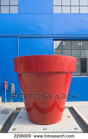 Close-up of flower pot sculpture in front of building View Large Photo Image Stock Photo - Close-up of flower pot sculpture in front of building . Fotosearch