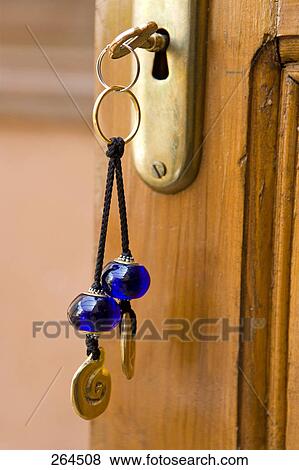 Stock Photo - Close-up of key in door lock . Fotosearch