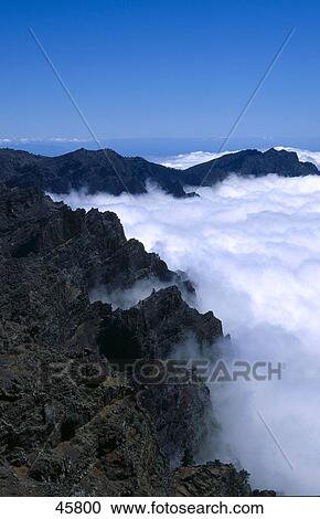 Clouds near mountains, Caldera De Taburiente, La Palma, Canary Islands, Spain View Large Photo Image Stock Image - Clouds near mountains, Caldera De Taburiente, La Palma, Canary Islands, Spain . Fotosearch