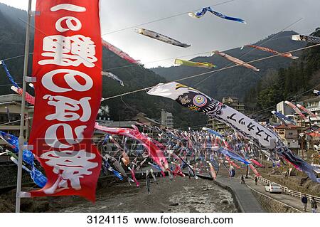 Colourful carp-shaped wind socks flying in the breeze, Oguni, Kyushu, Japan, high angle view View Large Photo Image Stock Photography - Colourful carp-shaped wind socks flying in the breeze, Oguni, Kyushu, Japan, high angle view . Fotosearch