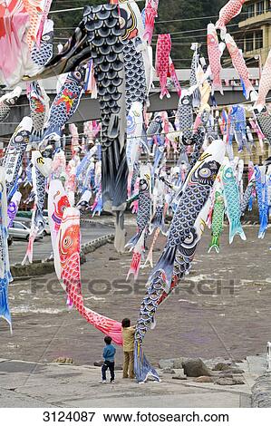 Colourful carp-shaped wind socks, Oguni, Kyushu, Japan, high angle view View Large Photo Image Stock Photo - Colourful carp-shaped wind socks, Oguni, Kyushu, Japan, high angle view . Fotosearch