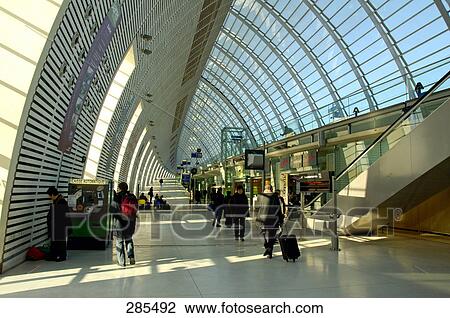 Stock Image - Commuters in railway station, Provence-Alpes-Cote d'Azur, France . Fotosearch