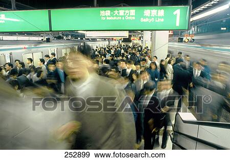 Commuters in subway station, Japan View Large Photo Image Stock Photo - Commuters in subway station, Japan . Fotosearch