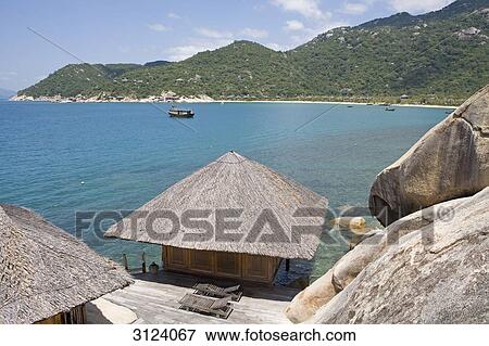 Cottages of the Evason Hideaway hotel, Nha Trang, Vietnam, high angle view View Large Photo Image Stock Photo - Cottages of the Evason Hideaway hotel, Nha Trang, Vietnam, high angle view . Fotosearch