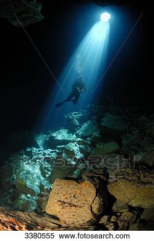 Diver above heap of boulders, Cape Verde, low angle view View Large Photo Image Stock Photography - Diver above heap of boulders, Cape Verde, low angle view . Fotosearch