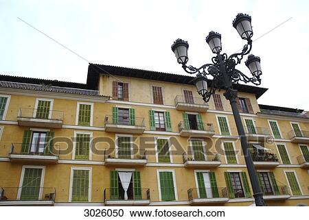 Facade in the centre of Palma de Mallorca, street lamp in the foreground, Majorca, Spain, low angle view View Large Photo Image Stock Image - Facade in the centre of Palma de Mallorca, street lamp in the foreground, Majorca, Spain, low angle view . Fotosearch