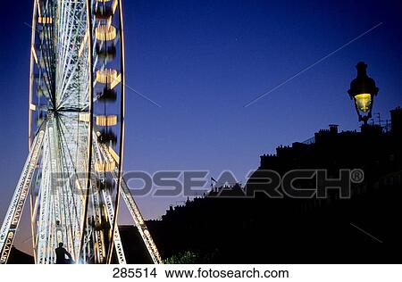 Ferris wheel at amusement park, Paris, Ile-de-France, France View Large Photo Image Picture - Ferris wheel at amusement park, Paris, Ile-de-France, France . Fotosearch