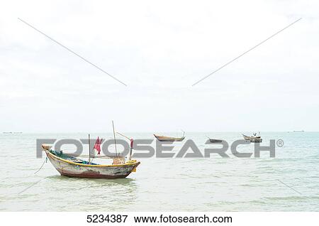 Stock Photo - Fisher boats, South Chinese Ocean, Mui Ne, Vietnam, Asia . Fotosearch