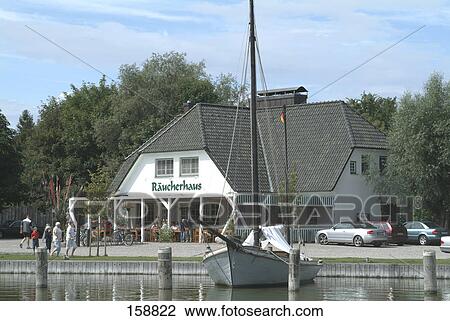 Fishing boat at harbor, Ahrenshoop, Fischland-Darss-Zingst Peninsula, Mecklenburg-Vorpommern, Germany View Large Photo Image Stock Image - Fishing boat at harbor, Ahrenshoop, Fischland-Darss-Zingst Peninsula, Mecklenburg-Vorpommern, Germany . Fotosearch