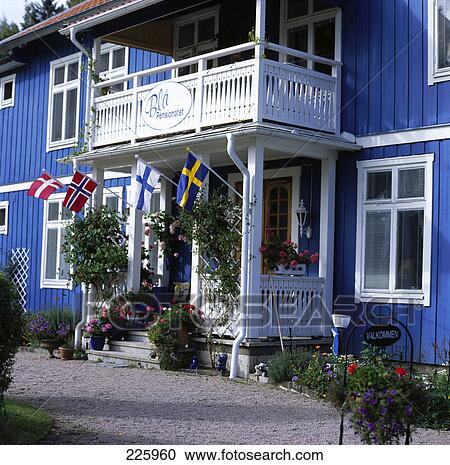 Stock Image - Flags at entrance of building . Fotosearch