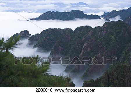 Fog on mountains, Huangshan Mountains, Huangshan, Anhui Province, China View Large Photo Image Stock Photo - Fog on mountains, Huangshan Mountains, Huangshan, Anhui Province, China . Fotosearch