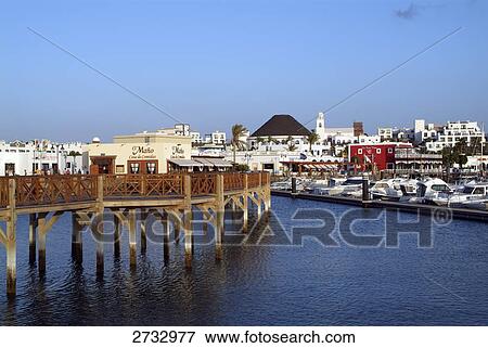 Footbridge in sea, Marina Rubicon, Playa Blanca, Lanzarote, Canary Islands, Spain View Large Photo Image Stock Photo - Footbridge in sea, Marina Rubicon, Playa Blanca, Lanzarote, Canary Islands, Spain . Fotosearch