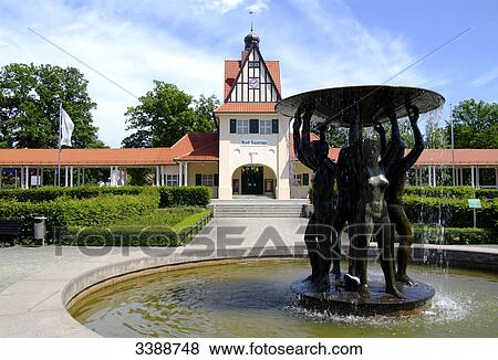 Fountain and railway station in Bad Saarow, Germany View Large Photo Image Stock Photo - Fountain and railway station in Bad Saarow, Germany . Fotosearch