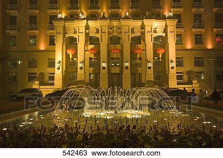 Fountain in front of building at night, Beijing, China View Large Photo Image Stock Image - Fountain in front of building at night, Beijing, China . Fotosearch