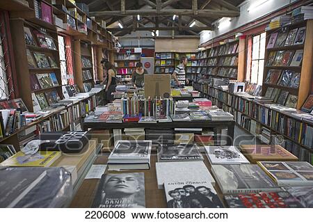 Four people inside bookshop, Beijing, China View Large Photo Image Stock Photo - Four people inside bookshop, Beijing, China . Fotosearch