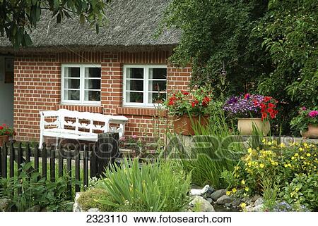 Garden in front of cottage, Middelhagen, Monchgut, Rugen, Mecklenburg-Vorpommern, Germany View Large Photo Image Stock Image - Garden in front of cottage, Middelhagen, Monchgut, Rugen, Mecklenburg-Vorpommern, Germany . Fotosearch
