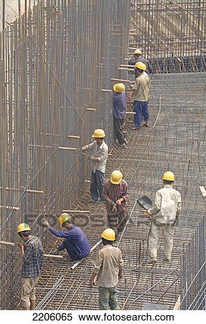 Group of construction workers at construction site View Large Photo Image Stock Photography - Group of construction workers at construction site . Fotosearch
