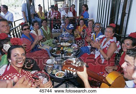 Group of people celebrating festival, El Rocio, Huelva, Andalusia, Spain View Large Photo Image Picture - Group of people celebrating festival, El Rocio, Huelva, Andalusia, Spain . Fotosearch