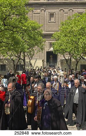 Group of people participating in religious procession, Andalusia, Spain View Large Photo Image Stock Photo - Group of people participating in religious procession, Andalusia, Spain . Fotosearch