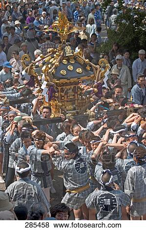 Group of people participating in religious procession, Asakusa Kannon Temple, Asakusa, Tokyo Prefecture, Japan View Large Photo Image Stock Photo - Group of people participating in religious procession, Asakusa Kannon Temple, Asakusa, Tokyo Prefecture, Japan . Fotosearch