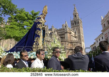 Group of people participating in parade, La Giralda, Seville, Spain View Large Photo Image Stock Photography - Group of people participating in parade, La Giralda, Seville, Spain . Fotosearch