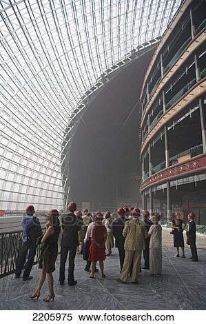 Group of people wearing helmets inside building, Beijing, China View Large Photo Image Stock Photography - Group of people wearing helmets inside building, Beijing, China . Fotosearch