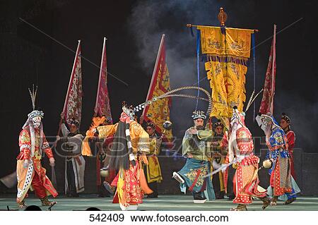 Group of stage performers performing in theater, Beijing, China View Large Photo Image Stock Photo - Group of stage performers performing in theater, Beijing, China . Fotosearch