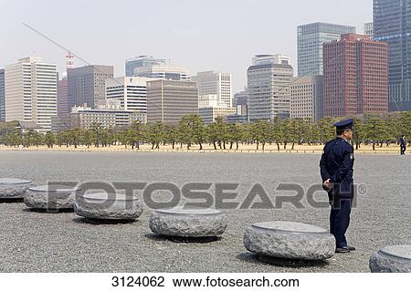 Guard in a park, Tokyo, Japan View Large Photo Image Stock Image - Guard in a park, Tokyo, Japan . Fotosearch