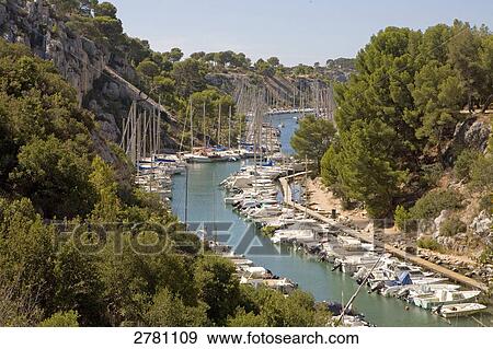 High angle view of boats in calanques, Cassis, Bouches-du-Rhone, Provence-Alpes-Cote d'Azur, France View Large Photo Image Stock Photo - High angle view of boats in calanques, Cassis, Bouches-du-Rhone, Provence-Alpes-Cote d'Azur, France . Fotosearch