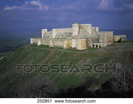 Stock Photo - High angle view of castle on hill . Fotosearch
