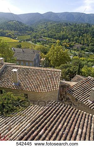 High angle view of rooftops of houses, Menerbes, Luberon, Vaucluse, Provence-Alpes-Cote d'Azur, France View Large Photo Image Stock Photography - High angle view of rooftops of houses, Menerbes, Luberon, Vaucluse, Provence-Alpes-Cote d'Azur, France . Fotosearch