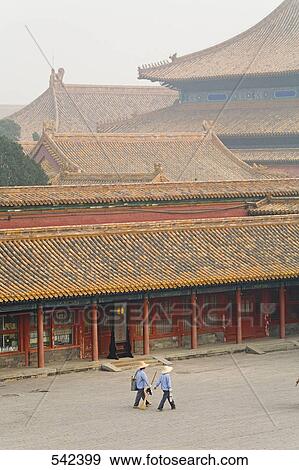Stock Photo - High angle view of tourists on the move, Forbidden City, Beijing, China . Fotosearch