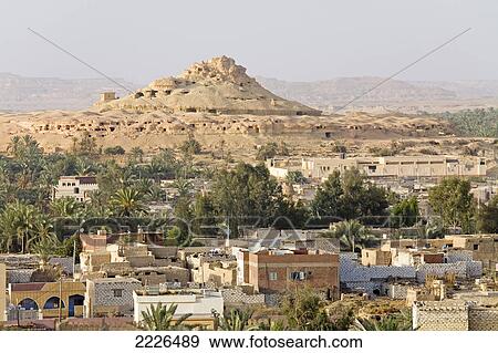 Stock Photo - High angle view of town in desert, Siwa Oasis, Libyan Desert, Egypt . Fotosearch