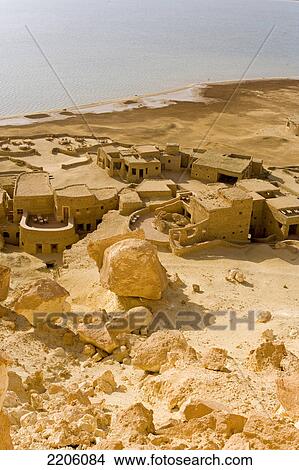 Picture - High angle view of village at bank of salt lake, Siwa Oasis, Libyan Desert, Egypt . Fotosearch