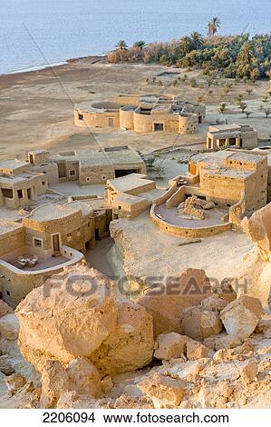 High angle view of village at bank of salt lake, Siwa Oasis, Libyan Desert, Egypt View Large Photo Image Picture - High angle view of village at bank of salt lake, Siwa Oasis, Libyan Desert, Egypt . Fotosearch