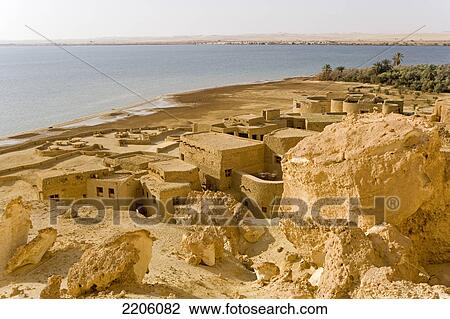 High angle view of village at bank of salt lake, Siwa Oasis, Libyan Desert, Egypt View Large Photo Image Stock Image - High angle view of village at bank of salt lake, Siwa Oasis, Libyan Desert, Egypt . Fotosearch