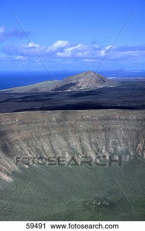 Stock Image - High angle view of volcanic crater, Canary Islands, Spain, Europe . Fotosearch