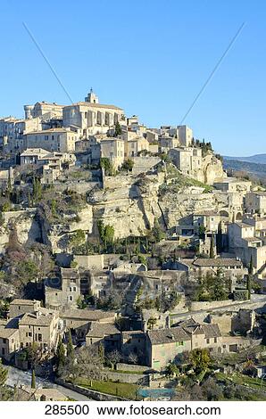 Stock Image - Houses on hill, Gordes, Provence-Alpes-Cote d'Azur, France . Fotosearch