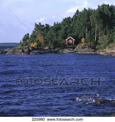 Stock Image - Hut at lakeside, Lake Vanern, Sweden . Fotosearch