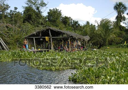 Stock Image - Hut by a riverside, Venezuela . Fotosearch