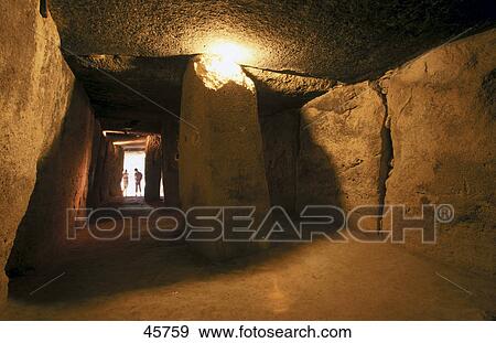 Stock Photo - Interiors of burial mound, Cueva de Menga, Antequera, Andalusia, Spain . Fotosearch