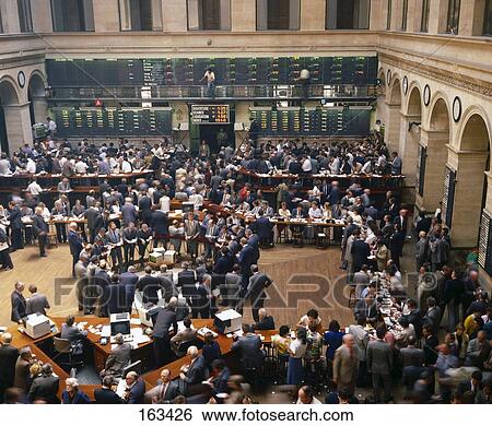 Stock Photograph - Interiors of crowded stock market, Paris, France . Fotosearch