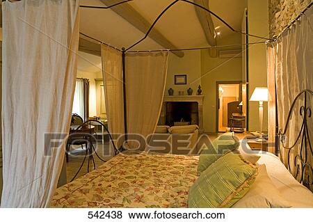 Stock Photo - Interiors of hotel room, La Bastide De Marie, Menerbes, Luberon, Vaucluse, Provence-Alpes-Cote d'Azur, France . Fotosearch