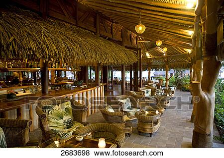 Interiors of resort's bar, Bora Bora Nui Hilton Resort, French Polynesia View Large Photo Image Stock Photo - Interiors of resort's bar, Bora Bora Nui Hilton Resort, French Polynesia . Fotosearch