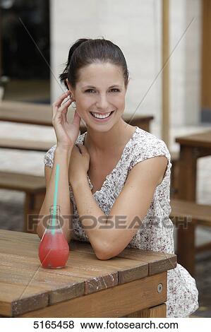 Junge Frau trinkt Limo View Large Photo Image Stock Photo - Junge Frau trinkt Limo . Fotosearch