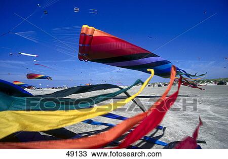 Kites flying in sky View Large Photo Image Stock Image - Kites flying in sky . Fotosearch