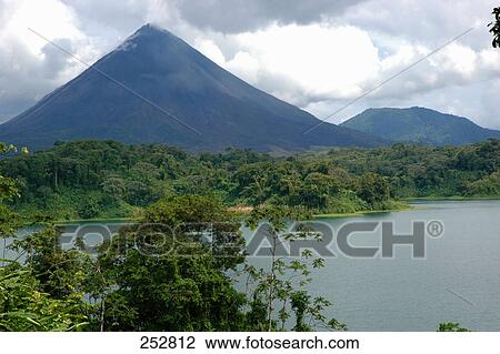 Lake in front of volcano, Arenal Volcano National Park, Costa Rica View Large Photo Image Stock Image - Lake in front of volcano, Arenal Volcano National Park, Costa Rica . Fotosearch
