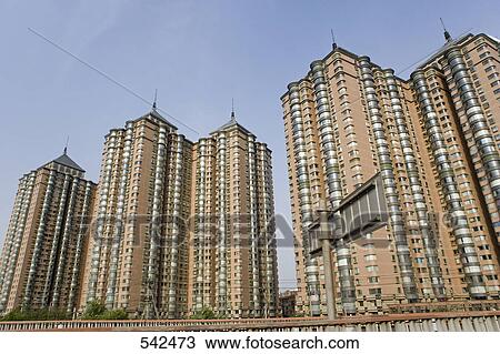 Low angle view of apartment buildings, Beijing, China View Large Photo Image Stock Image - Low angle view of apartment buildings, Beijing, China . Fotosearch