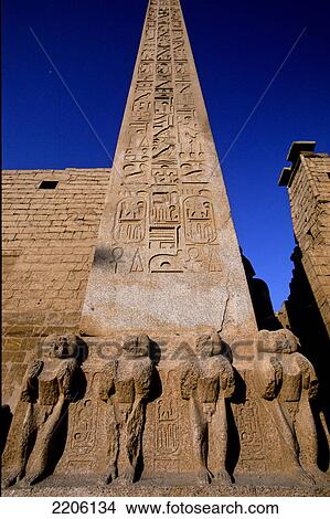 Picture - Low angle view of Egyptian sculptures against clear blue sky, Luxor, Egypt . Fotosearch